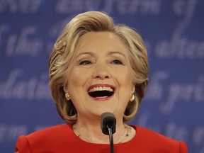 Democratic presidential nominee Hillary Clinton laughs during the presidential debate with Republican presidential nominee Donald Trump at Hofstra University in Hempstead, N.Y., on Sept. 26.