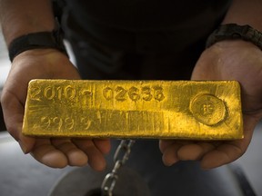 A gold bar, valued at half a million Canadian dollars, awaits smelting at the Royal Canadian Mint.