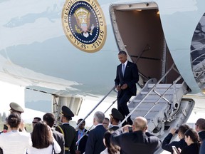 U.S. President Barack Obama arrives on Air Force One at Hangzhou Xiaoshan International Airport in Hangzhou in eastern China's Zhejiang province, Saturday, Sept. 3, 2016