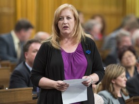Conservative MP Lisa Raitt speaks about Alzheimer's during Members Statements before Question Period in the House of Commons, Wednesday September 21.