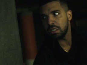 A still from Drake's new video in which he is totally saving the day.