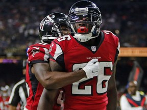 Atlanta Falcons' Tevin Coleman is congratulated after scoring one of three touchdowns in the Monday night NFL game in New Orleans. The Falcons improved to 2-1 with a 45-32 victory over the winless Saints, 0-3.