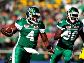 Darian Durant (4) runs the ball during first-half CFL action against the Edmonton Eskimos in Regina on Sept. 18.