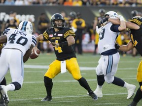Hamilton Tiger-Cats quarterback Zach Collaros  gets ready to throw under pressure in the pocket during the first half of their 49-36 win over the Toronto Argonauts in Hamilton on Monday.