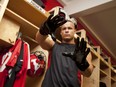 Former Calgary Stampeders' player turned entrepreneur Johnny Forzani show off his heated gloves that were unveiled at the Ryder Cup to provide hand warmth to the golfers prior to Day 1 of the Ryder Cup in Chaska, Minn.