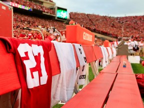 The jersey of deceased Nebraska punter Sam Foltz (27) is draped on the bench before an NCAA college football game against Fresno State in Lincoln, Neb. on Sept. 3.