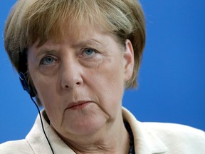 German Chancellor Angela Merkel attends a joint press conference with Prime Minister of Malaysia Najib Razak, as part of a meeting at the chancellery in Berlin, Germany, Tuesday, Sept. 27, 2016.