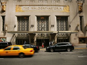 Traffic passes New York's landmark Waldorf Astoria Hotel on June 27, 2016 in New York City.