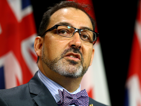 Ontario Premier Kathleen Wynne did not appear to know about an upcoming $700-per-ticket fundraiser with Energy Minister Glenn Thibeault, above, and Transportation Minister Steven Del Duca.