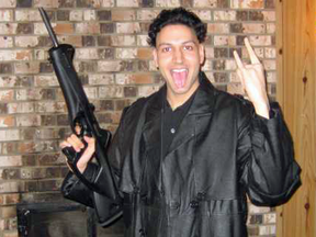 Dawson College shooter Kimveer Gill holds a Beretta Cx4 Storm semi-automatic carbine in a photo posted to a website. He would later use the weapon in a shooting rampage.