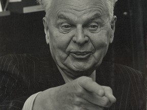 Circa 1975 photo showing Diefenbaker pointing and laughing at someone off camera.