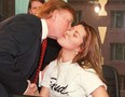 Alicia Machado kisses Donald Trump, owner of the Miss Universe pageant, during her daily fitness workout at a health center in New York in a 1997 file photo.