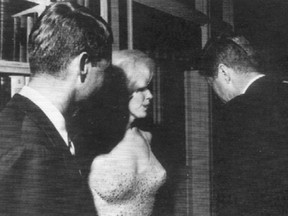 Bobby Kennedy, left, Marilyn Monroe and John F. Kennedy chat after she sang happy birthday to the president in 1962.