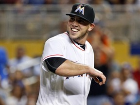 Jose Fernandez smiles as he leaves the mound during a game against the Los Angeles Dodgers on Sept. 9.