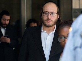 Mayer Herskovic, shown leaving court last week, was found guilty Friday of gang assault and other charges in an attack on a black student, Taj Patterson, in the Williamsburg section of Brooklyn in 2013.