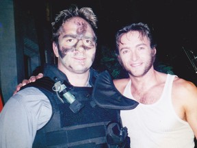 Former stuntman Michael Roselli with Hugh Jackman, whom he worked with on the X-men movies. Roselli says his insurance company paid for private surgery by for-profit medicine crusader Dr. Brian Day, but then was left to the public health system to treat serious complications.