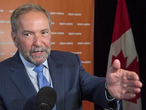 NDP leader Tom Mulcair addresses media prior to a caucus meeting Wednesday, September 14, 2016 in Montreal.