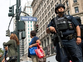 A member of the New York City Police Department stands guard in Herald Square, September 18, 2016 in New York City.