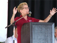 Premiere Kathleen Wynne acknowledges the crowd after being booed about rising hydro rates at the International Plowing Match on Tuesday Sept. 20, 2016.