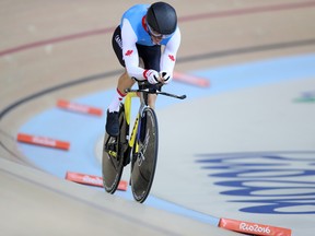 Canada's Tristen Chernove races to a silver medal  during the men's C2 3,000-metre individual pursuit at the Rio Paralympics on Friday.