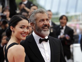 Mel Gibson and Rosalind Ross pose for photographers upon arrival at the awards ceremony at the 69th international film festival in Cannes this past September.
