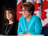 Rosanna Di Paola, Public Services and Procurement Canada's associate assistant deputy minister, left, and Public Works Deputy Minister Marie Lemay speak about the Phoenix pay system in August.