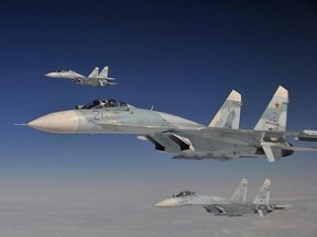 Russian Federation Air Force Su-27 Sukhois intercept a simulated hijacked aircraft entering Russian airspace on Aug. 27, 2013, during Exercise Vigilant Eagle