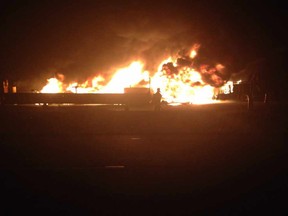 The scene of a fiery crash on Highway 401 early Wednesday.