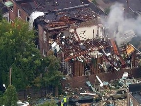 In this frame from video provided by WABC-TV, smoke rises from a house that exploded in the Bronx borough of New York on Tuesday, Sept. 27, 2016