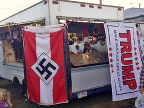Bloomsburg Fair organizers shuttered the booth of Lawrence Betsinger, a vendor selling Nazi flags, on Monday, Sept. 26, 2016, after deeming some of his merchandise offensive. Betsinger pleaded guilty to child pornography charges in 2007