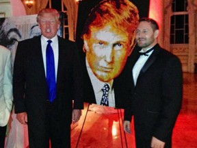 Trump with the painting that he bought.