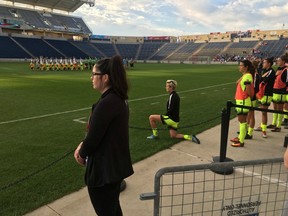 Megan Rapinoe kneels during the national anthem before a National Women's Soccer League game on Sept. 4.