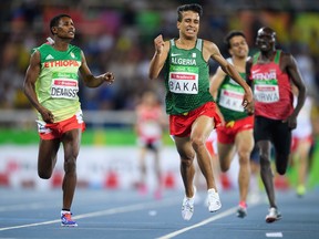 Abdellatif Baka narrowly wins the Gold Medal ahead of Tamiru Demisse in the Men's 1500m - T13 Final in the Olympic Stadium.