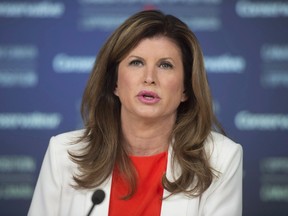 Interim Conservative leader Rona Ambrose speaks during a news conference in Ottawa, Thursday, June 9, 2016. Ambrose says that she does not support Kellie Leitch's proposal to screen new immigrants for "anti-Canadian values."