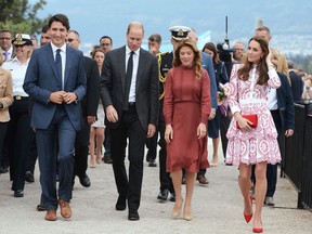 (L-R) Canadian Prime Minister Justin Trudeau, Prince William  the Duke of Cambridge, Sophie Gregoire Trudeau, and Catherine the Duchess of Cambridge take a walk at the Kitsilano Coast Guard station, in Vancouver, British Columbia on September 25, 2016.