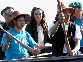 Catherine, Duchess of Cambridge helps row a traditional war canoe in Haida Gwaii, B.C., on Sept. 30, 2016.