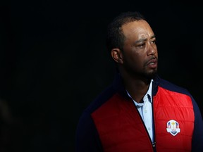 U.S. vice-captain Tiger Woods looks on during a photo session at the Ryder Cup on Sept. 27.