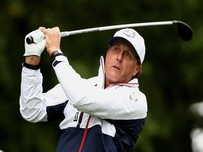 Phil Mickelson plays a practice shot at the Ryder Cup on Sept. 28.