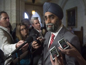 Minister of National Defence Minister Harjit Sajjan speaks with the media before Question Period on Parliament Hill in a June 15, 2016, file photo.