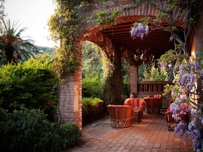 A lounge is situated among wisteria at a spa in Tecate, Baja California.