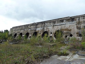 The Pinawa Dam, shown on Monday Sept. 12, 2016, in Pinawa, eastern Manitoba, was decommissioned in 1951 and is now the centrepiece of a provincial heritage park. Visitors can walk around and on parts of the massive structure, which is slowly being reclaimed by nature.