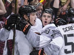 Team North America's Connor McDavid and Jack Eichel celebrate a goal against Finland during the World Cup of Hockey.