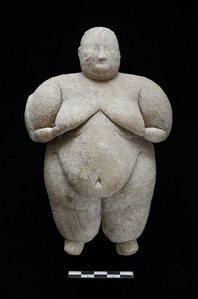 Large 'breasts and belly' on 8,000-year-old female statue honours