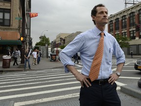 In a 2013 photo,  Anthony Weiner campaigns for the mayoralty of New York City.