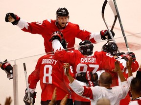 Steven Stamkos joins the goal celebration with Canada teammates Sidney Crosby and Drew Doughty against the Czech Republic on Saturday, Sept. 17.