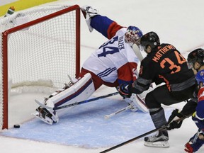 North America's Auston Matthews scores against Czech Republic goalie Petr Mrazek  during the third period on Wednesday in Pittsburgh. The Czech Republic won 3-2.