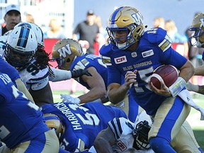Winnipeg Blue Bombers quarterback Matt Nichols runs a quarterback sneak during CFL action against the Toronto Argonauts in Winnipeg on Sept. 17.