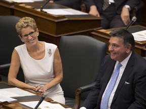 Ontario Premier Kathleen Wynne and Finance Minister Charles Sousa at the opening the new session  at Queen's Park.