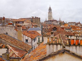 A view of clay rooftops and chimney pots in Perigueux from the roof of La Tour Mataguerre.