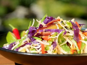 The Coconut Vegetable Slaw from Washington, D.C.'s Bad Saint includes cabbage, carrots, snow peas, fresh coconut and slivers of lime leaves.